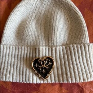 Coco Chanel brooch and beanie